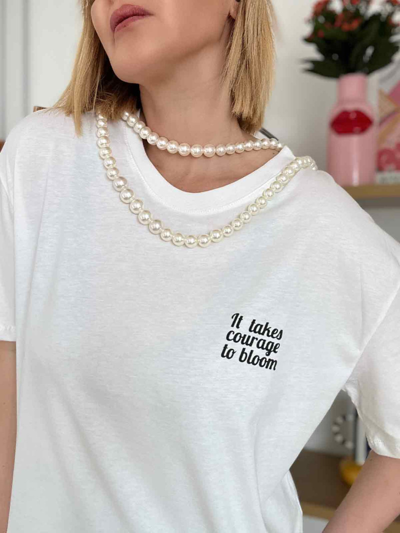 Le tee-shirt "IT TAKES...