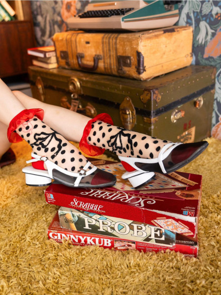 Chaussette transparente a volants avec nœud a pois