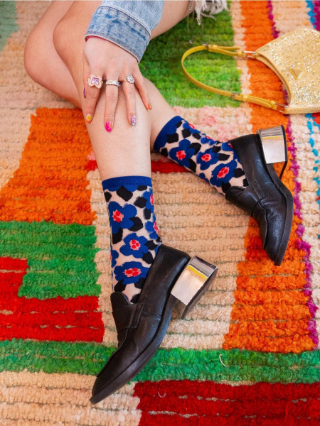 Chaussettes transparentes à motif floral bleu vif